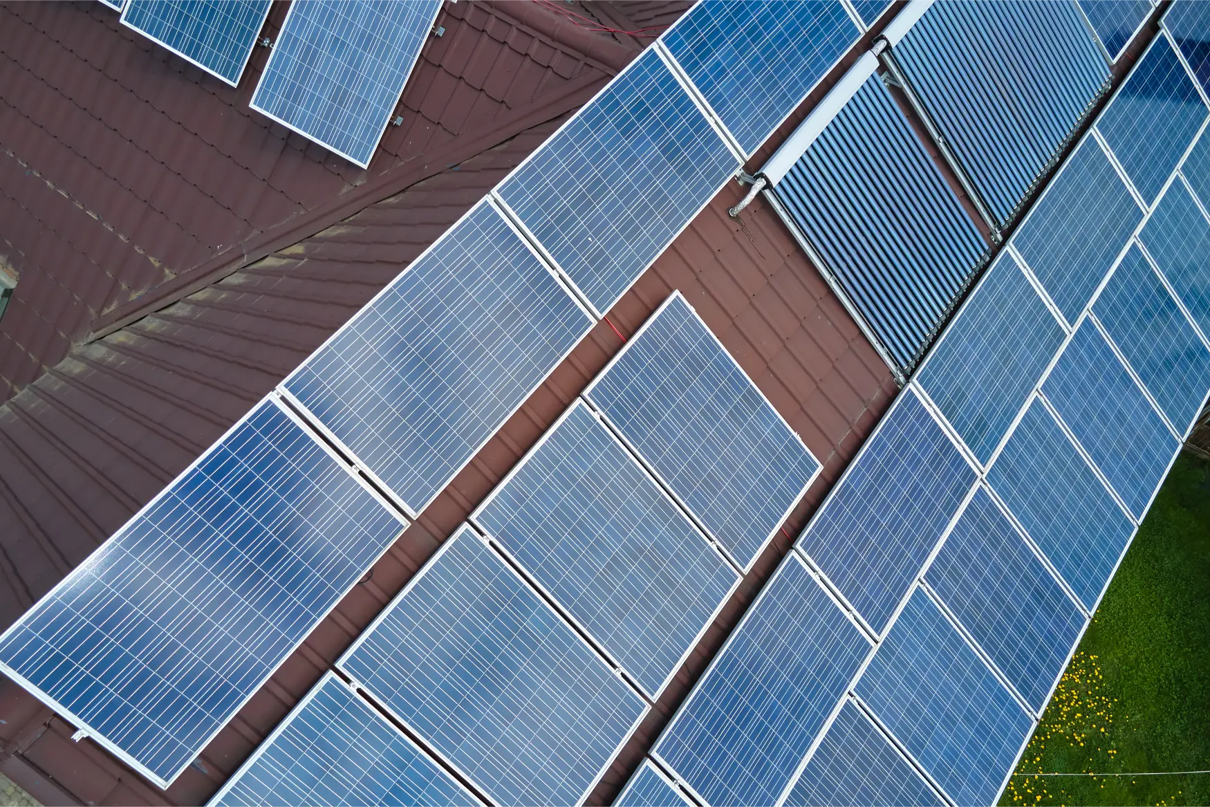 aerial-view-building-roof-with-rows-blue-solar-photovoltaic-panels-producing-clean-ecological-electric-energy-renewable-electricity-with-zero-emission-concept